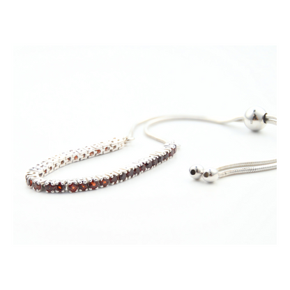 Garnet Tennis Bracelet in Sterling Silver